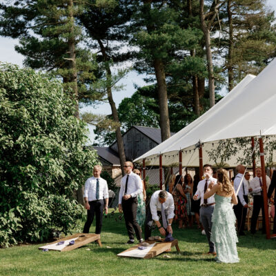 Wedding guests playing lawn games