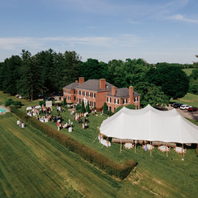 Aerial view of Georgian estate with tented reception